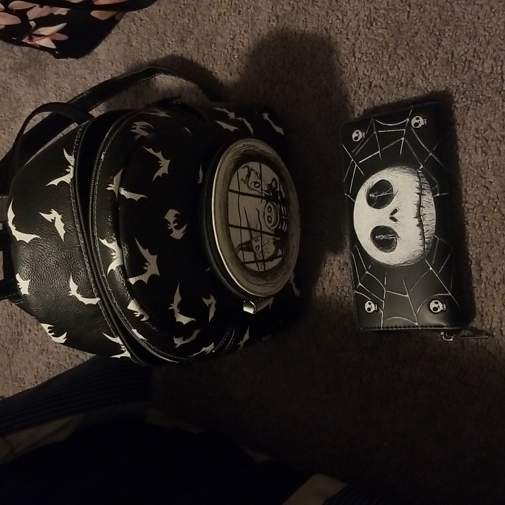 Nightmare Before Christmas backpack style purse and matching wallet.